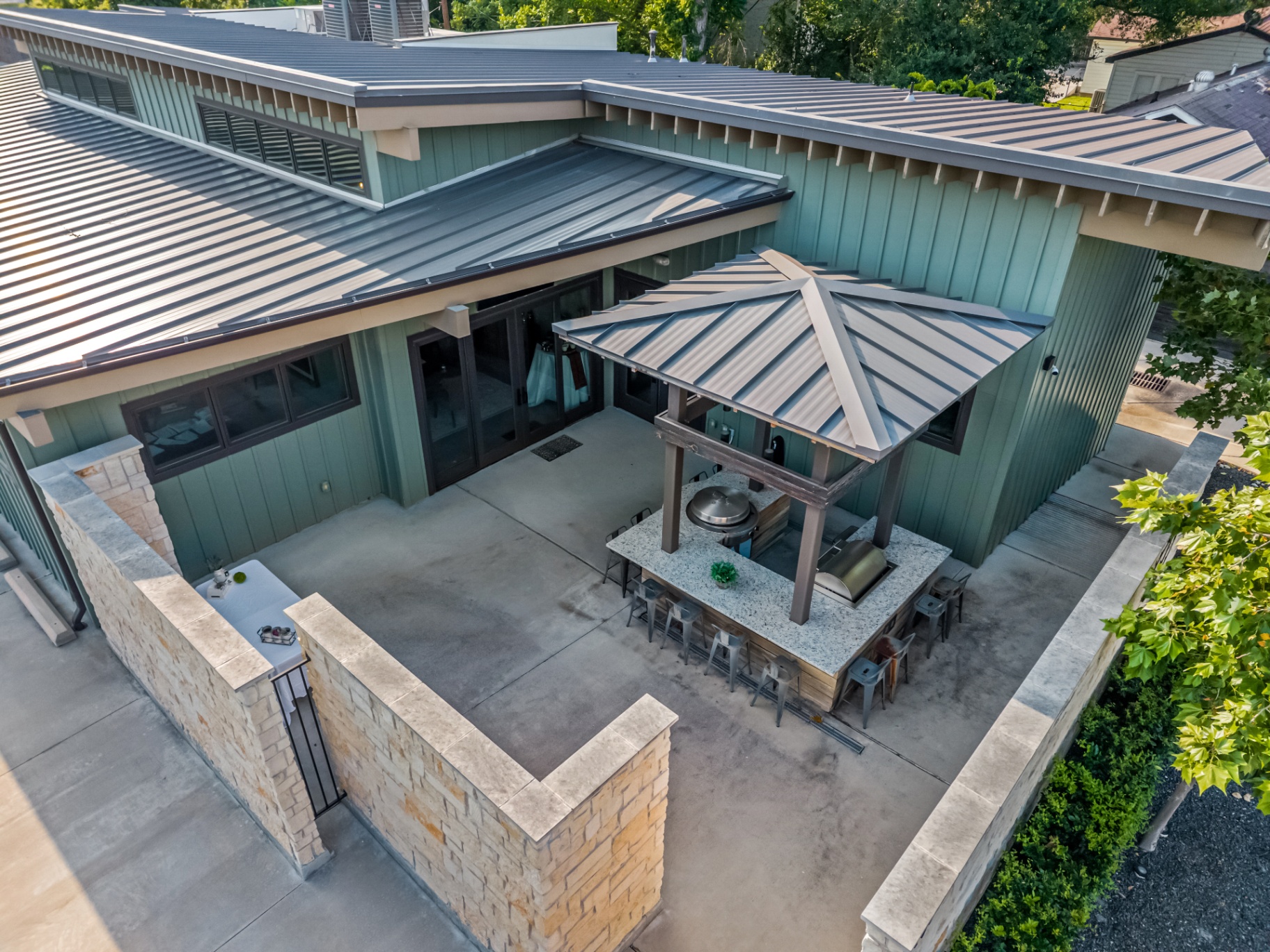 Private courtyard with covered outdoor kitchen